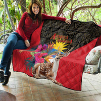 Red and black quilt blanket with deer, tropical flowers, and Antigua and Barbuda print