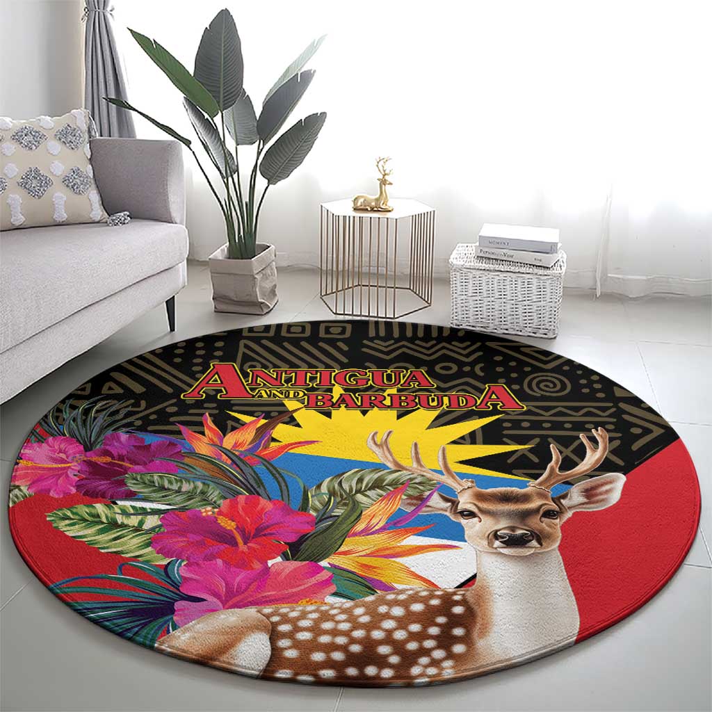 Round area rug featuring deer face, pink and red tropical flowers, black patterned border