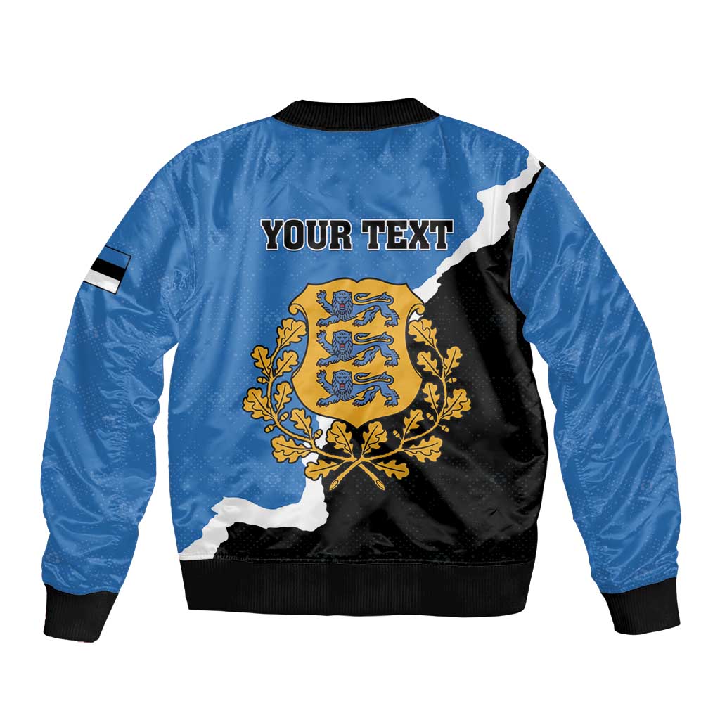 Blue bomber jacket with black back panel, "YOUR TEXT" and Estonia crest graphic, ribbed hem