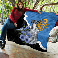 Blue and black quilt with diagonal white stripe, wolf and blue flower print, crest emblem