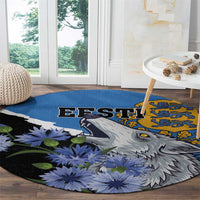 Round area rug with EFSTI text, grey wolf profile, blue flowers and green leaves