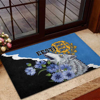 Blue doormat with wolf, blue flowers, and Esti crest emblem over black left side