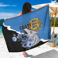 Blue sarong featuring a grey wolf crest with purple flowers, black-and-white accents