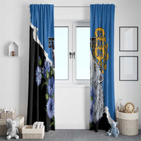 Blue window curtain set with wolf crest, black/white diagonal panels, and blue flower motif