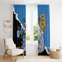 Blue tall window curtains with wolf portrait, yellow crest, and blue floral design