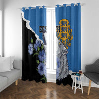 Blue window curtains with hanging loops, wolf portrait, yellow crest, and blue flower motif
