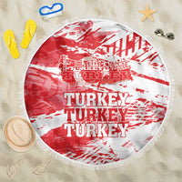 Round Turkey-themed beach blanket, red-and-white print, fringed border
