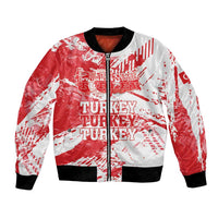 Red bomber jacket with black ribbed collar and cuffs, zip front, white grunge Turkey graphic