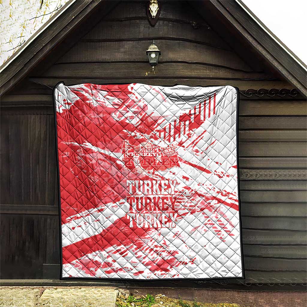 Red and white Turkey map quilt with repeated “TURKEY” typography and quilt stitching
