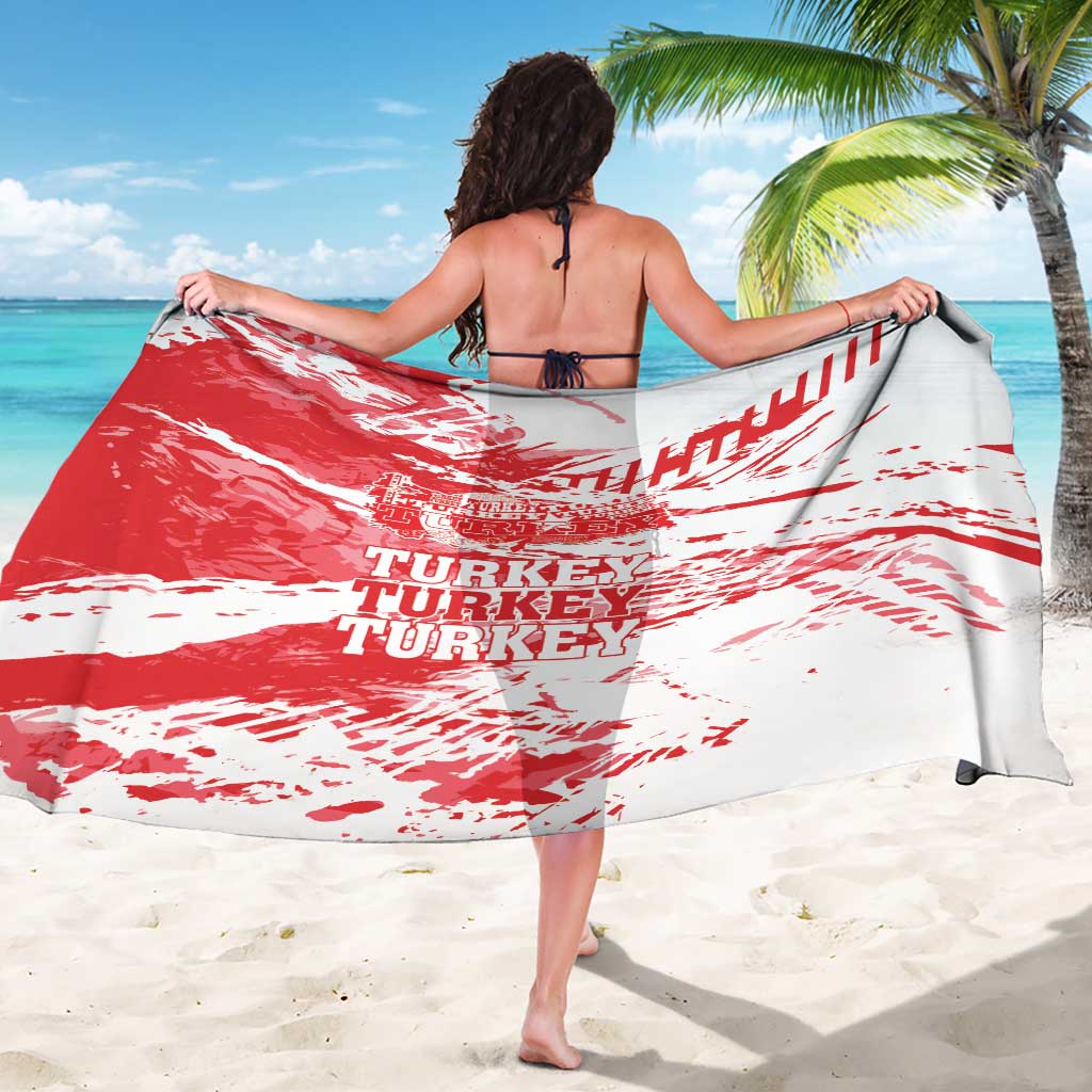 Red and white grunge Turkey map sarong with distressed text, wrapped around waist