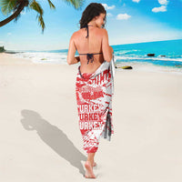 Red and white grunge Turkey map sarong with distressed text, tied at waist