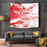 Red and white Turkey map wall tapestry hanging on a brick wall, repeated TURKEY text