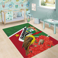 Suriname themed rectangular area rug with green top, red poinsettias, and bird