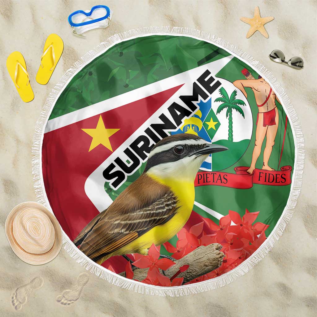 Round Suriname beach blanket, fringe edge; bird illustration over green and red panels