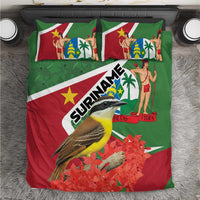 Suriname graphic duvet cover and pillowcases in green, red, and white with bird artwork