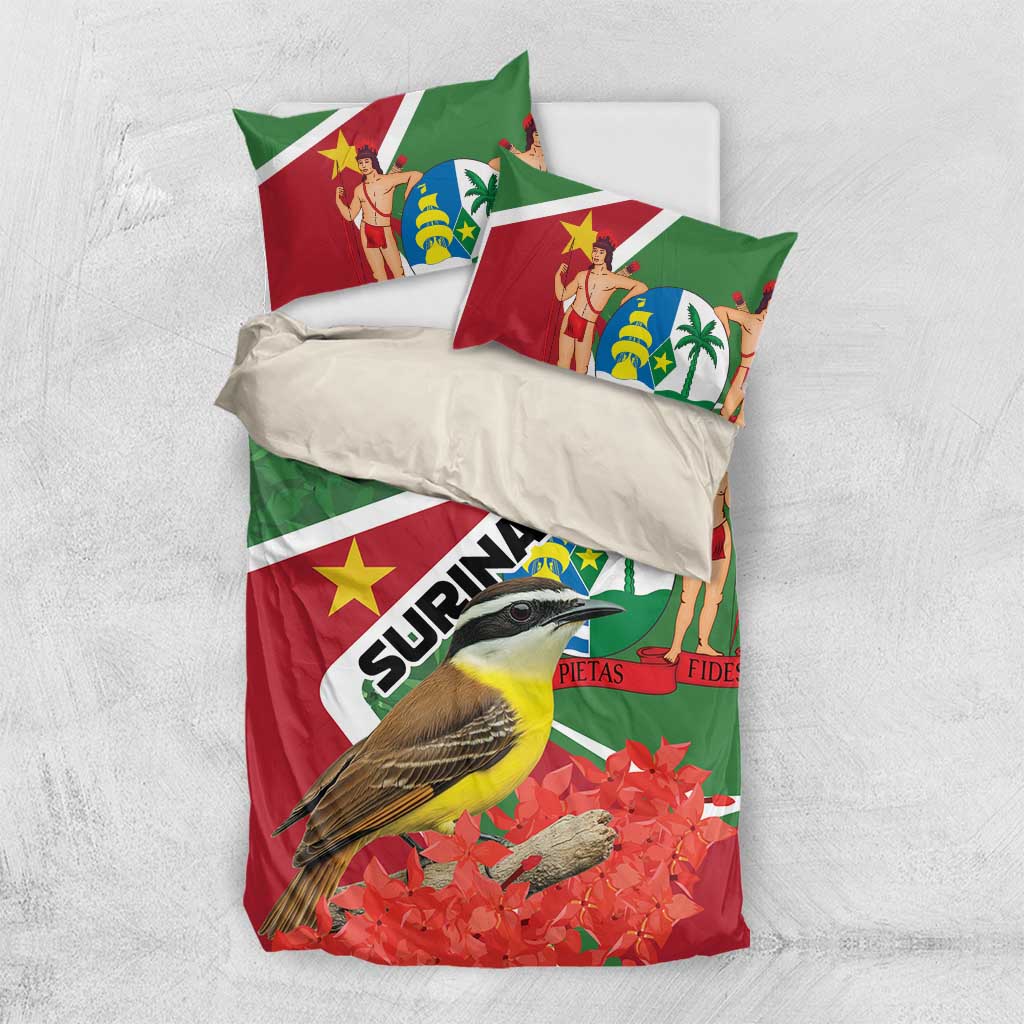 Green and red Suriname duvet cover with bird print and pillows on a light bed
