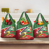 Three-pack green and red Suriname print tote bags with bird and produce graphics, short handles
