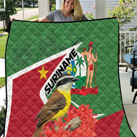 Suriname flag quilt in green, red, and white with bird, palm figure, and SURINAME text