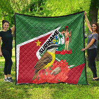 Suriname flag quilt with quilted pattern, bird artwork, palm dancer, and SURINAME logo