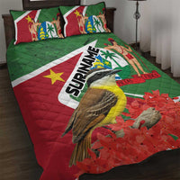 Green and red Suriname flag quilt bed set with matching patterned pillowcases