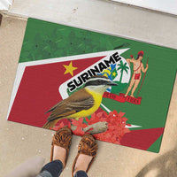 Green rubber doormat with Suriname emblem, bird and flowers on red/white diagonal stripe