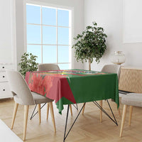 Suriname flag tablecloth in red and green with leaf pattern, draped over table