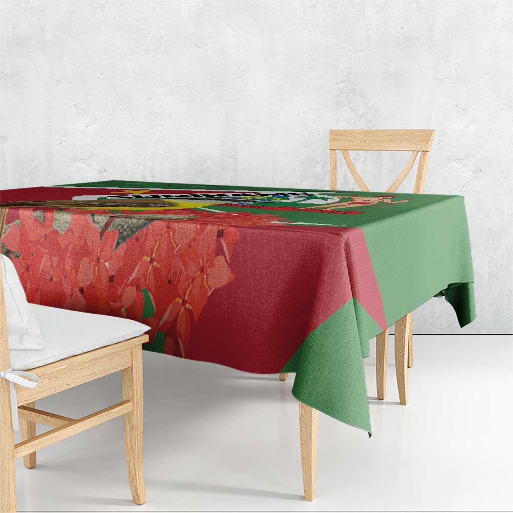 Suriname tablecloth corner drape showing bird and red floral motifs on green border
