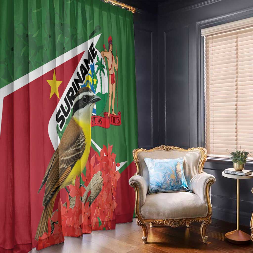 Green and red window curtain with bird, palm figure, and flag-style stripe pattern