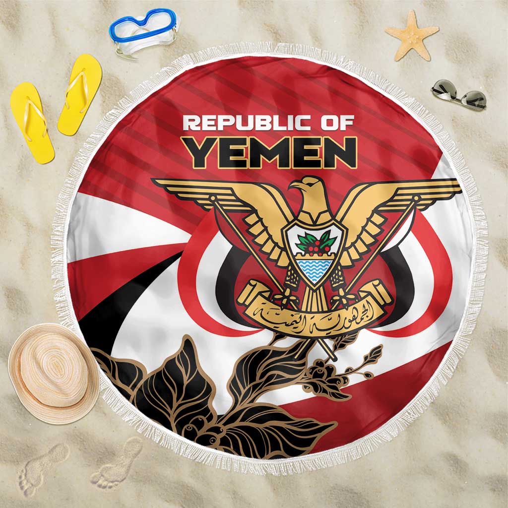Red Yemen beach blanket with round coat-of-arms graphic and white fringe edge
