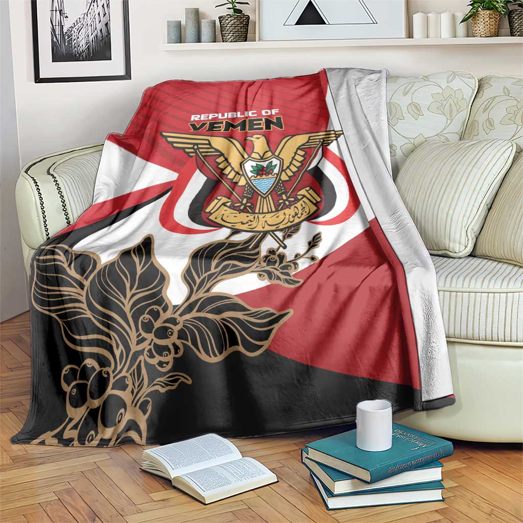 Red Yemen coat of arms blanket with large emblem, white bands, and black floral accents