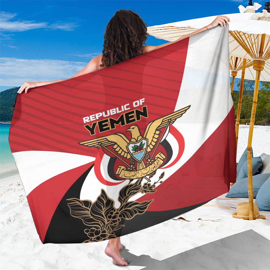 Red/white/black Yemen coat of arms sarong draped over shoulders