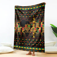 African Kwanzaa throw blanket with kinara candles, black base, geometric stripe pattern