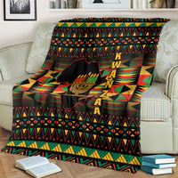 Kwanzaa throw blanket with kinara silhouette and vertical KWANZAA letters on black