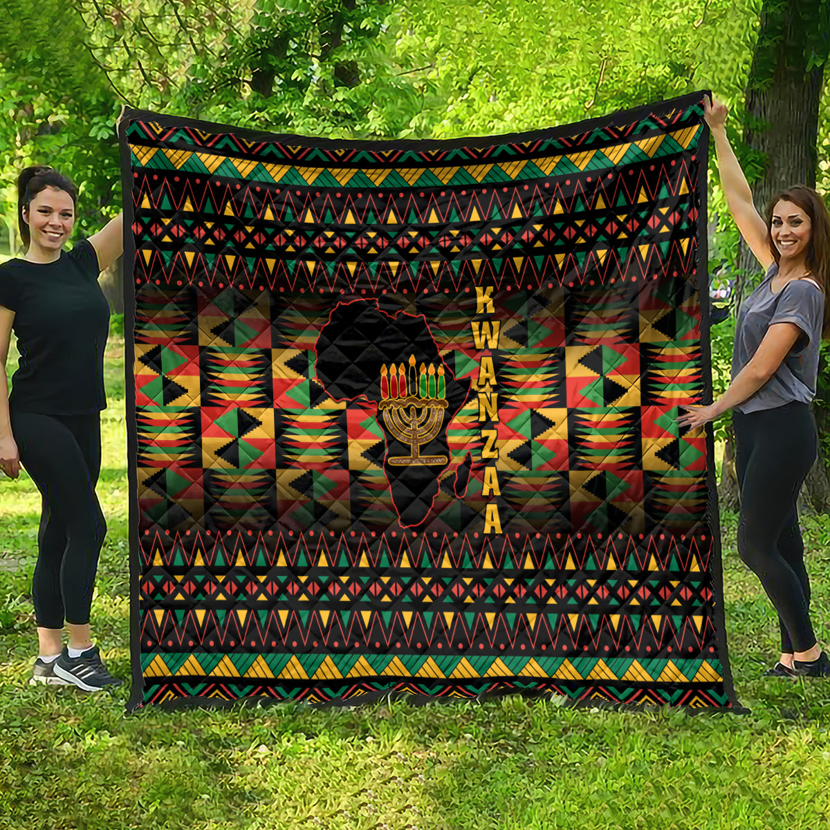 Kwanzaa festival quilt, full view with colorful geometric stripes and kinara candle graphic
