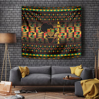 Kwanzaa tapestry with kinara candle silhouette and colorful African geometric border