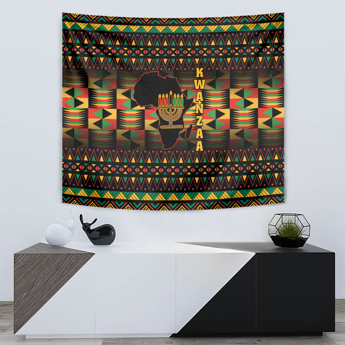 Kwanzaa tapestry with kinara candle motif, K W A N Z A letters, and geometric pattern