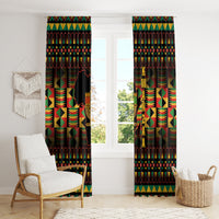 Kwanzaa window curtains in black with bright multicolor geometric stripes and vertical kinara text art.