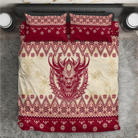 Red and cream Christmas bedding set with Krampus devil face and festive pattern