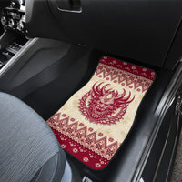 Single red and cream Krampus deer patterned car floor mat with holiday geometric trim.