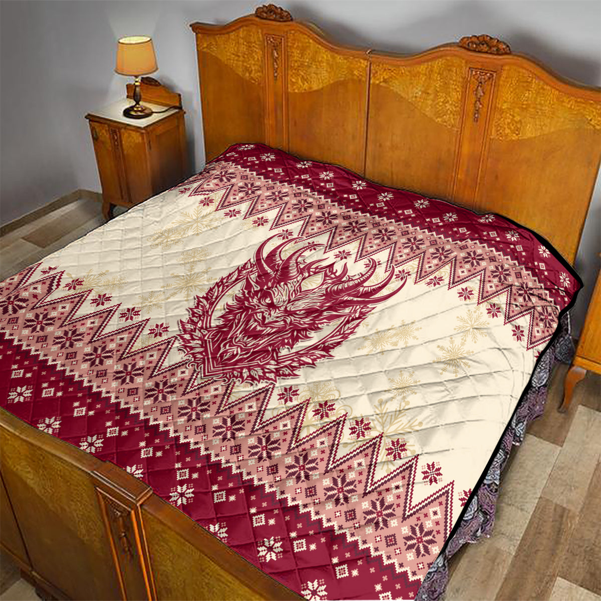 Red and cream quilt on bed with quilted texture and Krampus face festive stripe pattern.