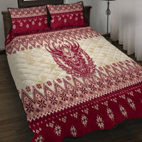 Red and cream quilt bed set with quilted demon center panel and matching pillow shams