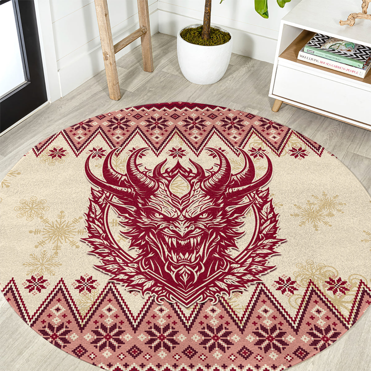 Red and cream round area rug with red Krampus horned face and festive geometric border