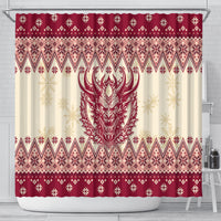 Christmas shower curtain with central red horned face, snowflake borders, red and cream