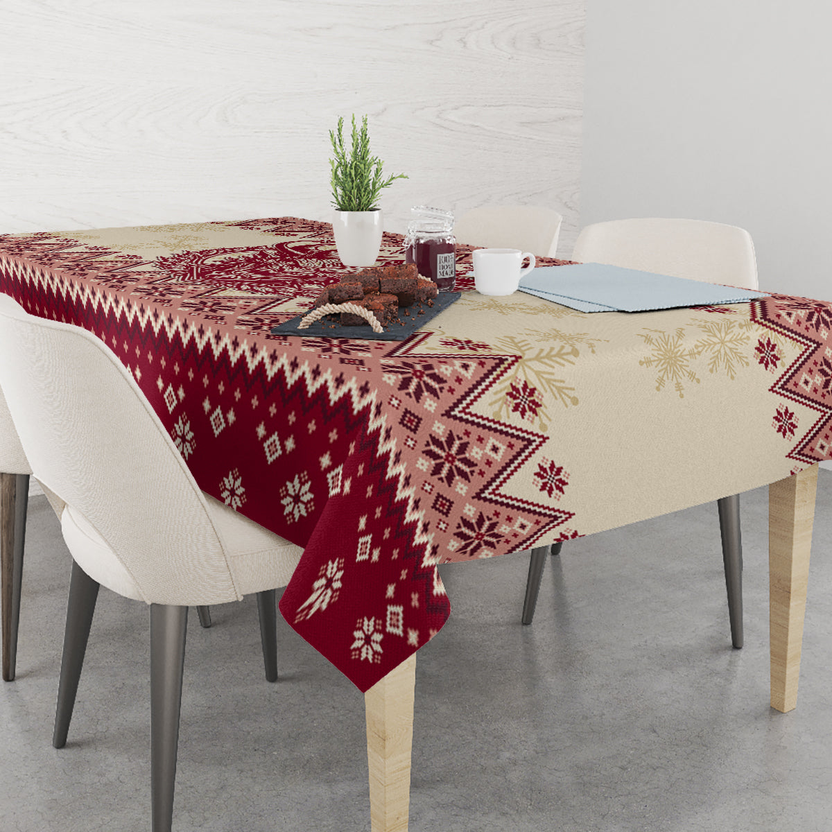 Red Christmas tablecloth with central Krampus graphic and geometric snowflake pattern