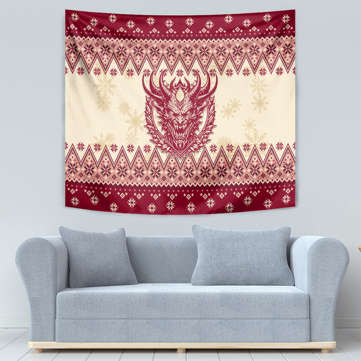 Christmas tapestry on wall above light-gray sofa, red-and-cream festive border and horned face