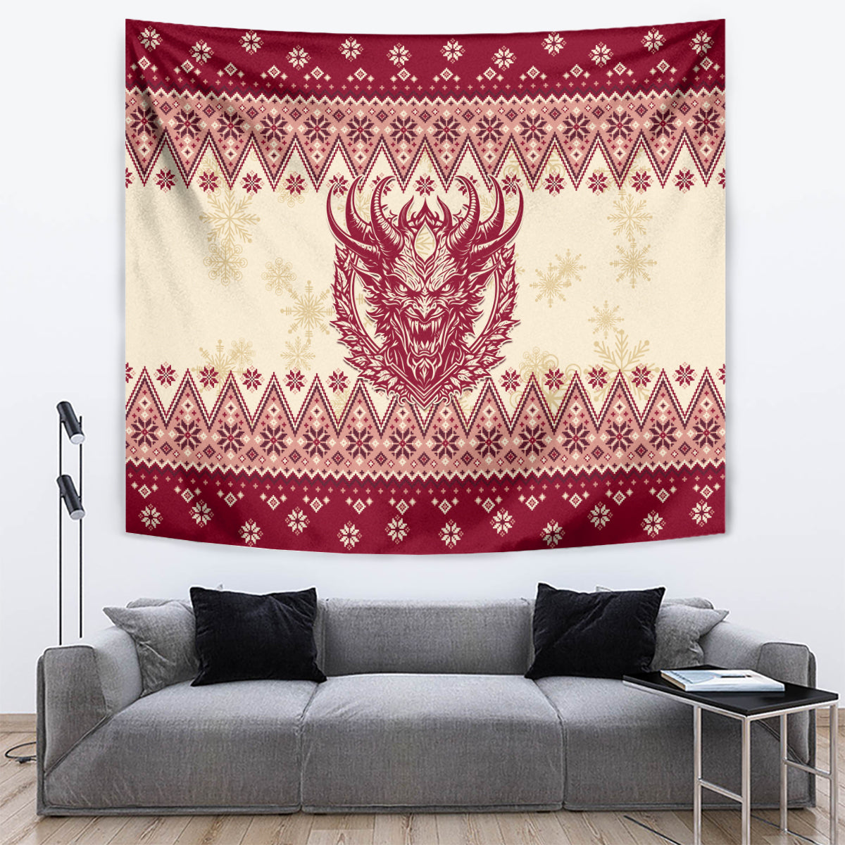 Christmas tapestry on wall above gray sofa, red-and-cream folk print with horned Krampus head