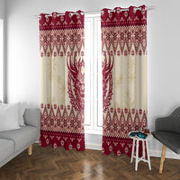 Red and cream Christmas curtain panels with winter border pattern and horned Krampus motif