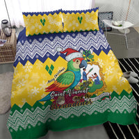 Close view of holiday bedding set: parrot illustration on yellow, blue zigzag, green border
