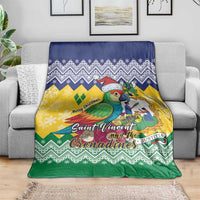 Christmas throw blanket showing parrot scene with Santa hat and green-yellow-blue zigzag trim