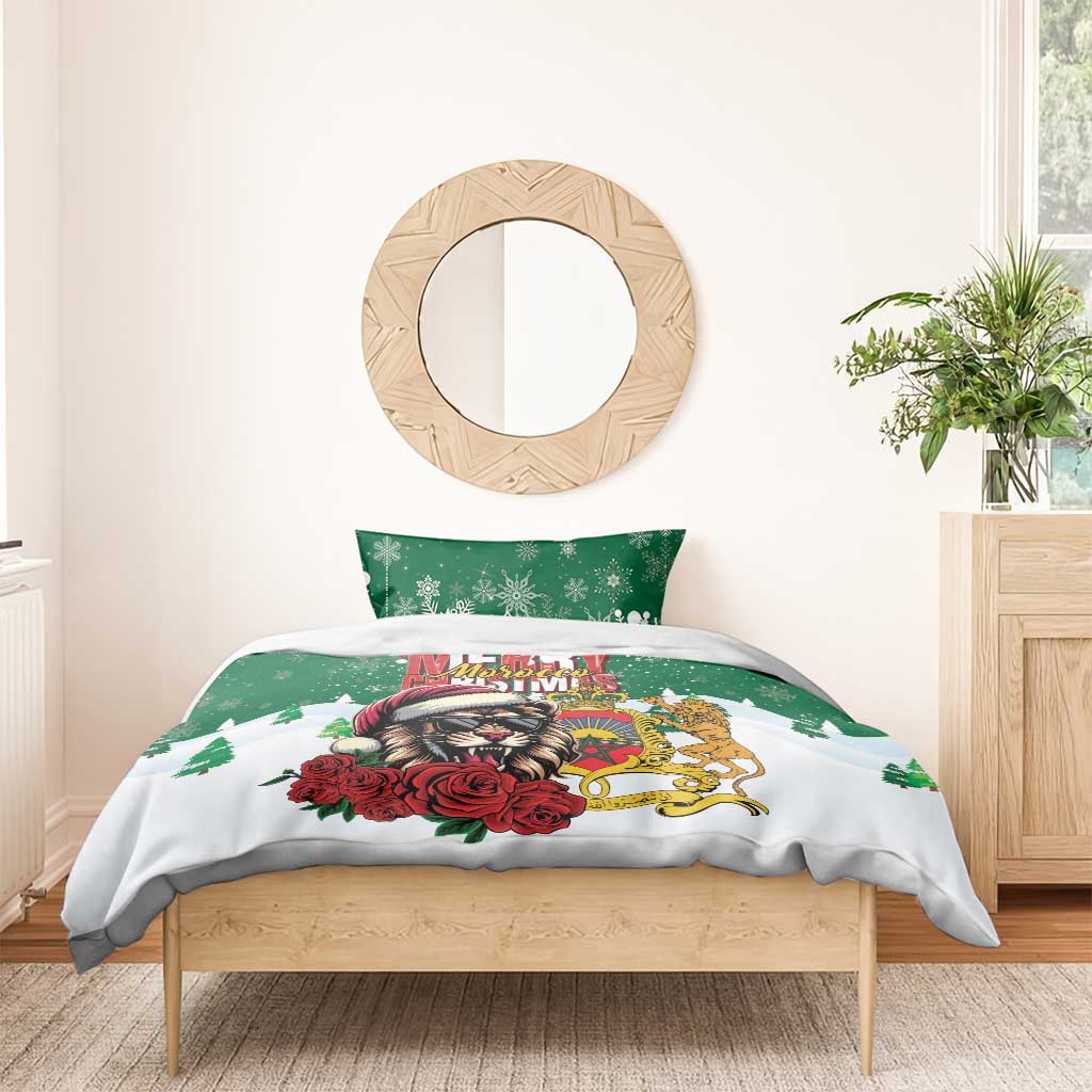 Green and white Santa lion duvet with two pillowcases on a light wood bed frame